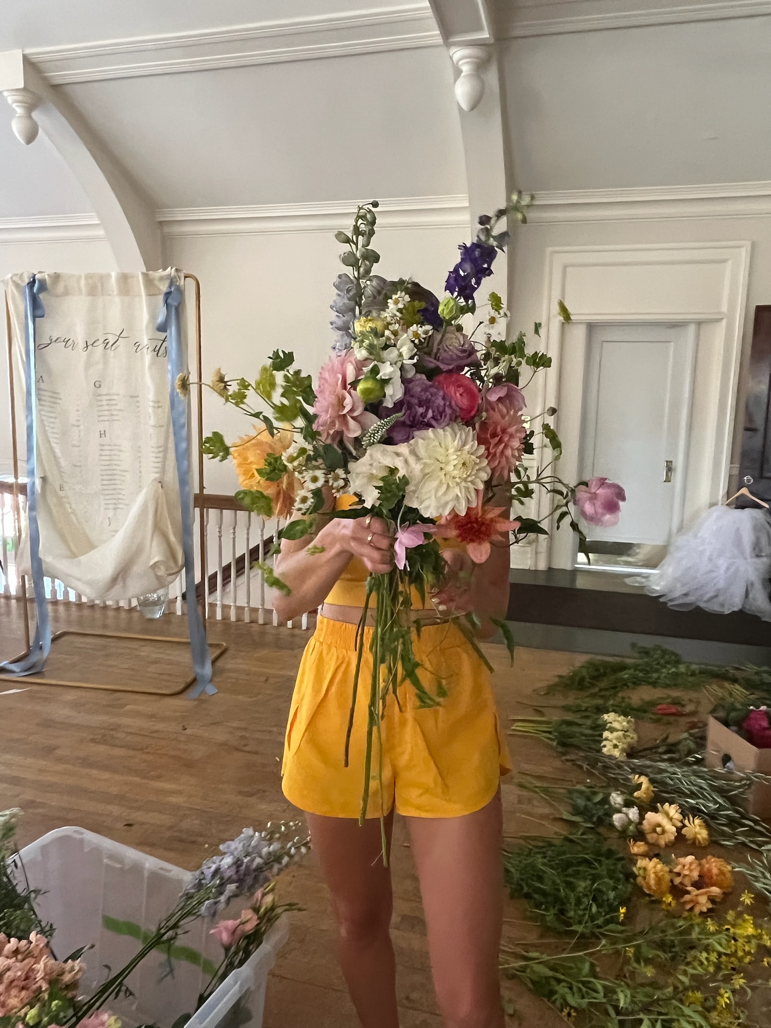 Colorful floral centerpiece in a matte vessel